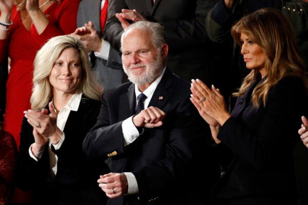 Rush Limbaugh reacts as First Lady Melania Trump, and his wife Kathryn, applaud, as President Donald Trump delivers his State of the Union address to a joint session of Congress on Capitol Hill in Washington on Feb. 4, 2020. (Patrick Semansky/AP Photo)