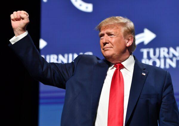 President Donald Trump gestures during the Turning Point USA Student Action Summit at the Palm Beach County Convention Center in West Palm Beach, Fla., on Dec. 21, 2019. (Nicholas Kamm/AFP via Getty Images)