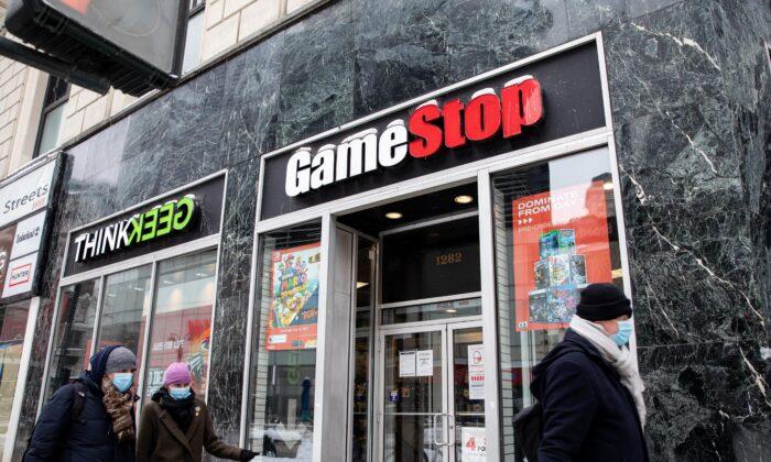 GameStop COO, Dogelon Mars Surge, Snowden on Shiba Inu, J&J Settlement, Cathie Wood’s FB Bet: 5 Headlines You May Have Missed From This Weekend