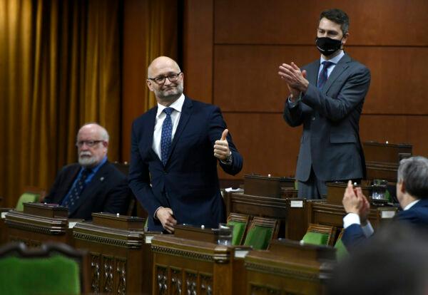 Minister of Justice David Lametti gives a thumbs up as he rises to vote in favour of a motion on Bill C-7, medical assistance in dying, in the House of Commons on Parliament Hill in Ottawa, Canada, on Dec. 10, 2020. (Justin Tang/The Canadian Press)