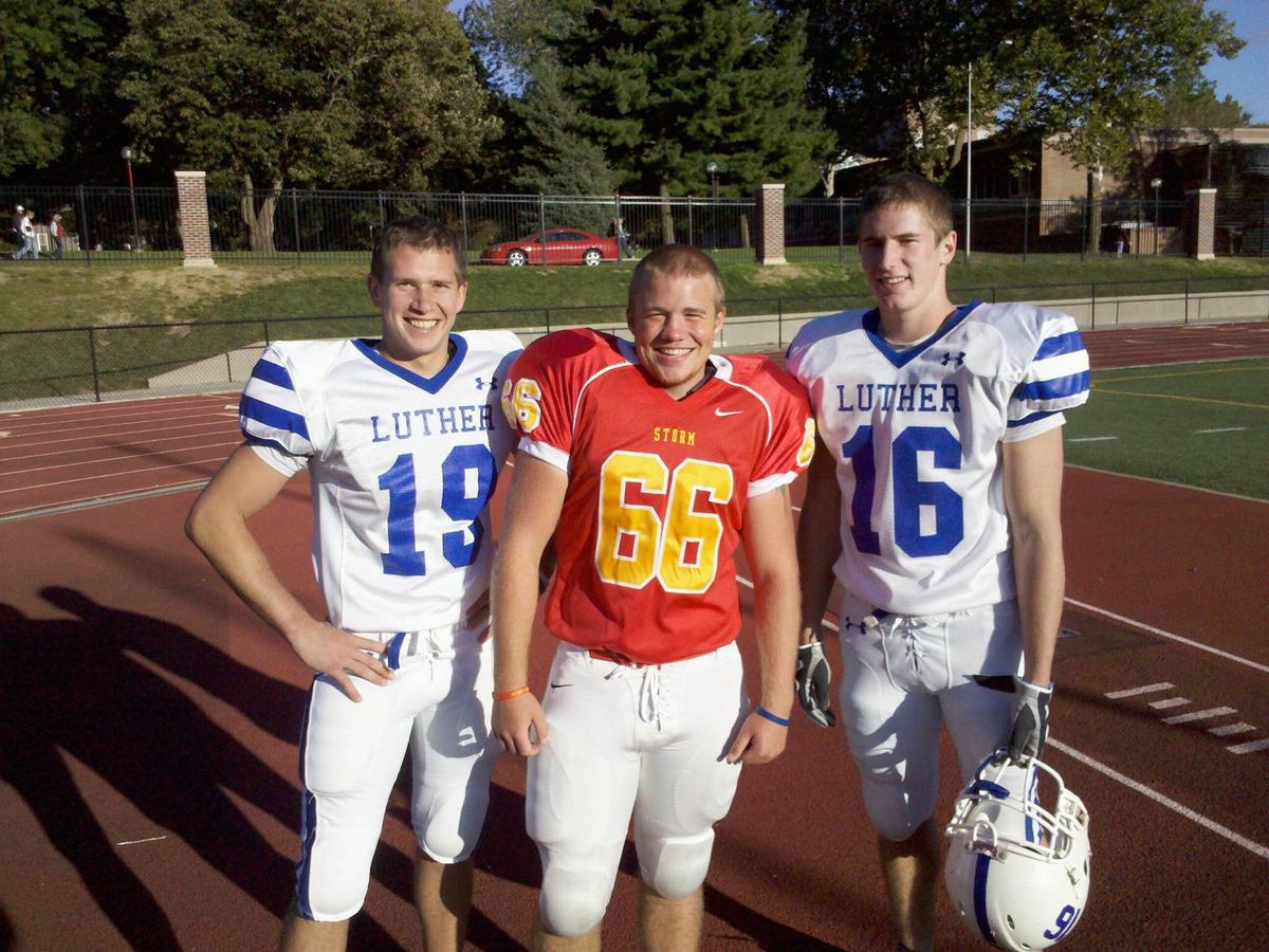  Chris Norton (R) with the members of his college football team. (Courtesy of <a href="https://www.facebook.com/chrisanorton16">Chris Norton</a>)