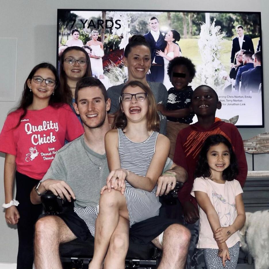 Chris Norton and Emily Summers with their four adopted daughters and two foster sons. (Courtesy of <a href="https://www.facebook.com/chrisanorton16">Chris Norton</a>)