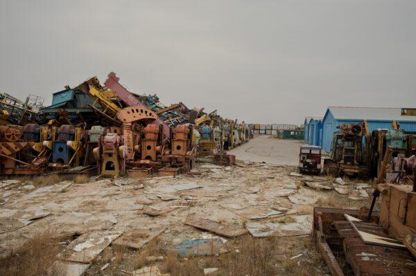 Rusted oil pump parts at a scrap yard in Daqing, northeastern China’s Heilongjiang Province on May 2, 2016. (Nicolas Asfouri/AFP via Getty Images)