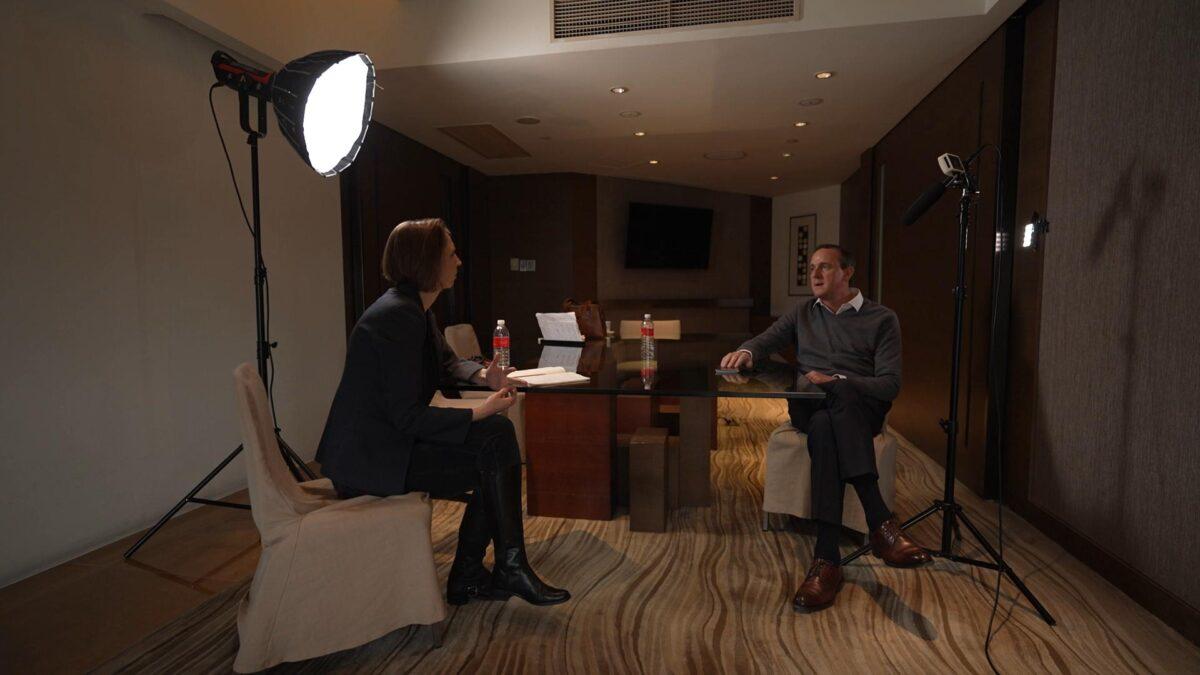 Richard O’Halloran, an Irish businessman banned from leaving China for two years, is seen talking to Yvonne Murray from RTÉ in Shanghai, in this image taken from a video interview broadcasted on Feb. 18, 2021. (Courtesy of RTÉ)
