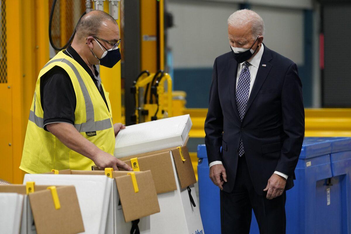 President Joe Biden tours a Pfizer manufacturing site in Portage, Mich., on Feb. 19, 2021. (Evan Vucci/AP Photo)