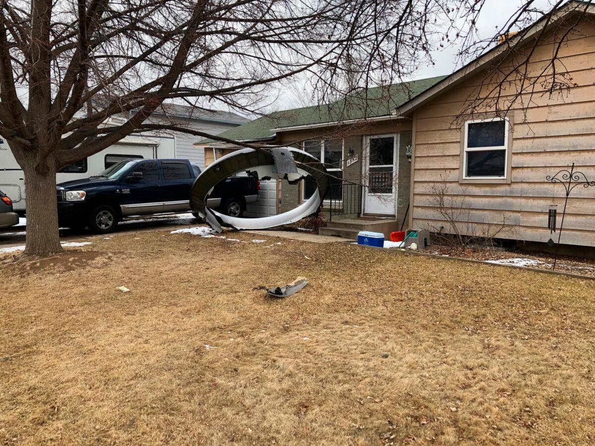 Debris is scattered in the front yard of a house at near 13th and Elmwood, in Broomfield, Colo., on Feb. 20, 2021.<br/>(Broomfield Police Department via AP)