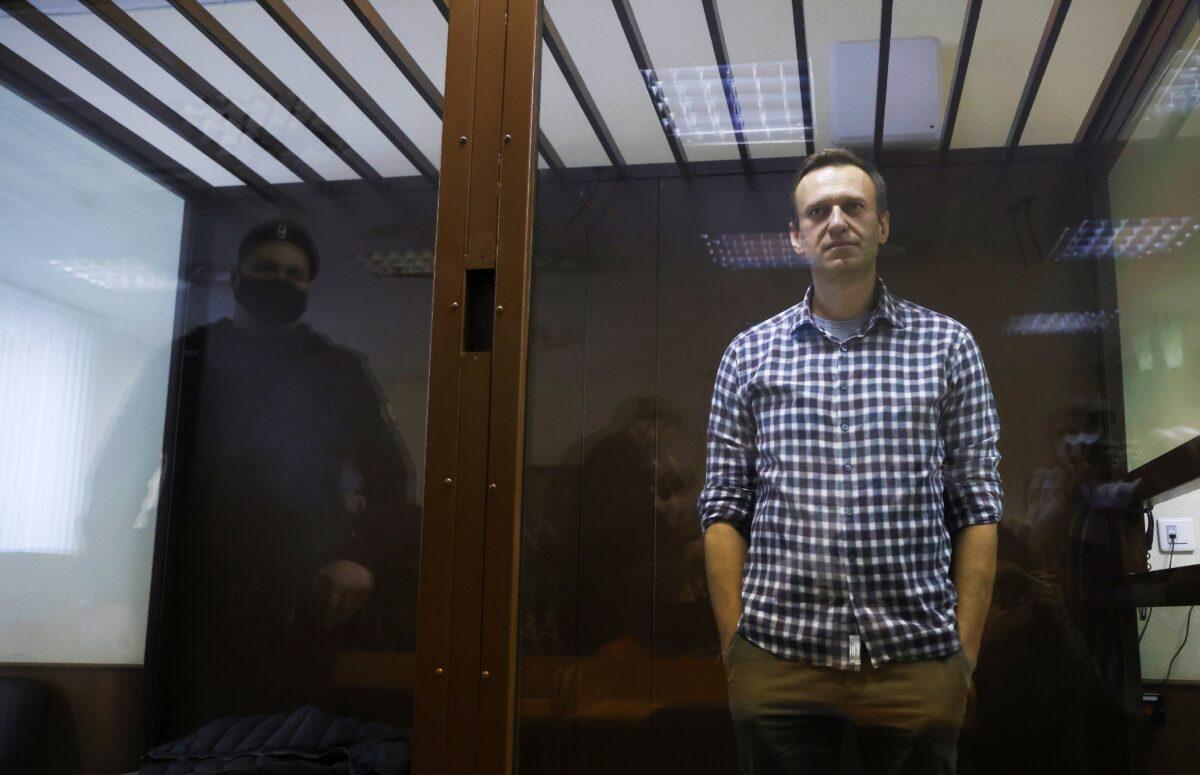 Russian opposition leader Alexei Navalny attends a hearing to consider an appeal against an earlier court decision to change his suspended sentence to a real prison term, in Moscow, Russia, on Feb. 20, 2021. (Maxim Shemetov/Reuters)