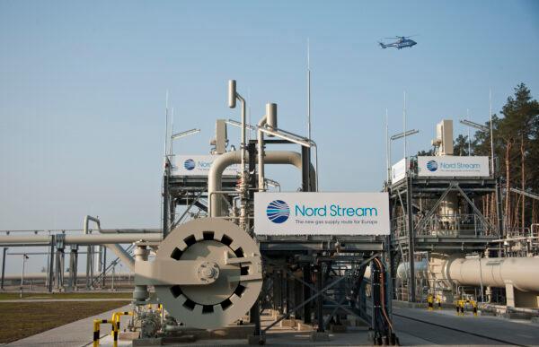 A helicopter flies over the Nordstream gas pipeline terminal prior to an inaugural ceremony for the first of Nord Stream's twin gas pipeline through the Baltic Sea, in Lubmin on Nov. 8, 2011. (John MacDougall/AFP via Getty Images)