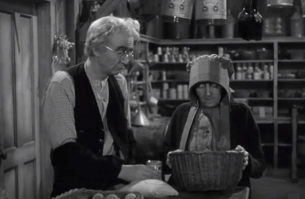 Pastor Rosier Pile (Walter Brennan), also the proprietor of the local general store, talks with his parishioner Mrs. York (Margaret Wycherly), in “Sergeant York.” (Warner Bros.)