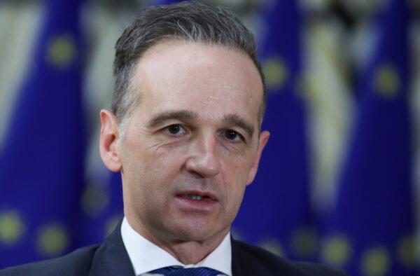 German Foreign Minister Heiko Maas speaks to the media as he arrives to attend an EU Foreign Ministers meeting in Brussels, Belgium, on Feb. 22, 2021. (Yves Herman/Pool/Reuters)