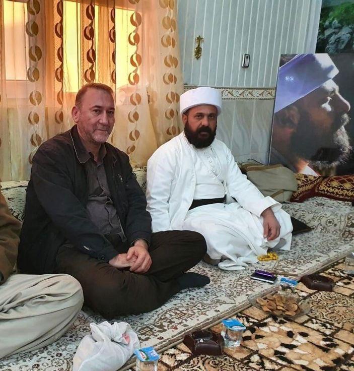 Gahzi Morad Barakat (L) and the religious leader Baba Sheikh in Lalish Temple in a valley near Mount Sinjar, Iraq, in November 2020. (Gahzi Morad Barakat)