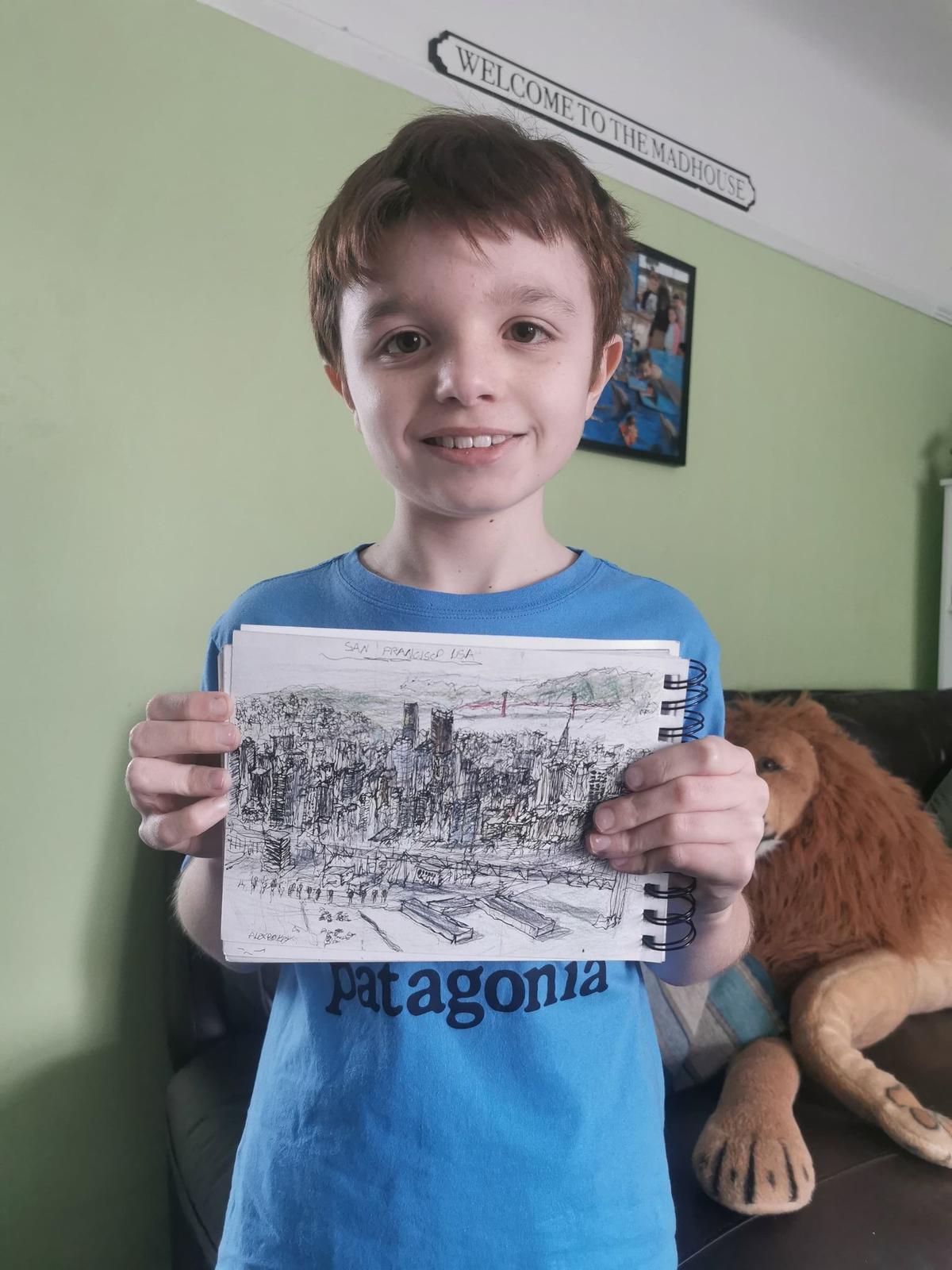  Alex with his latest picture of San Francisco (Courtesy of <a href="https://www.facebook.com/laura.jackson.9210">Laura Jackson</a>)