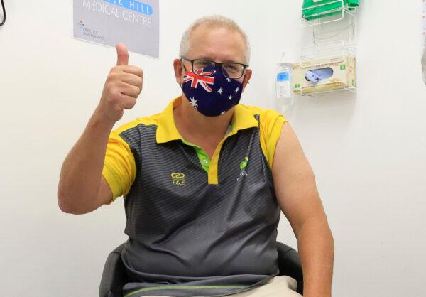 Australian Prime Minister Scott Morrison gives the thumbs up after receiving a COVID-19 vaccination at Castle Hill Medical Centre in Sydney, Australia, on Feb. 21, 2021. (Mark Evans/Getty Images)