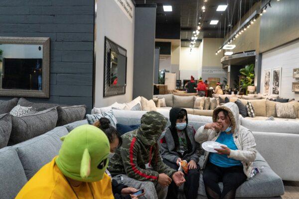 People take shelter at Gallery Furniture store after winter weather caused electricity blackouts in Houston, on Feb.18, 2021. (Go Nakamura/Getty Images)