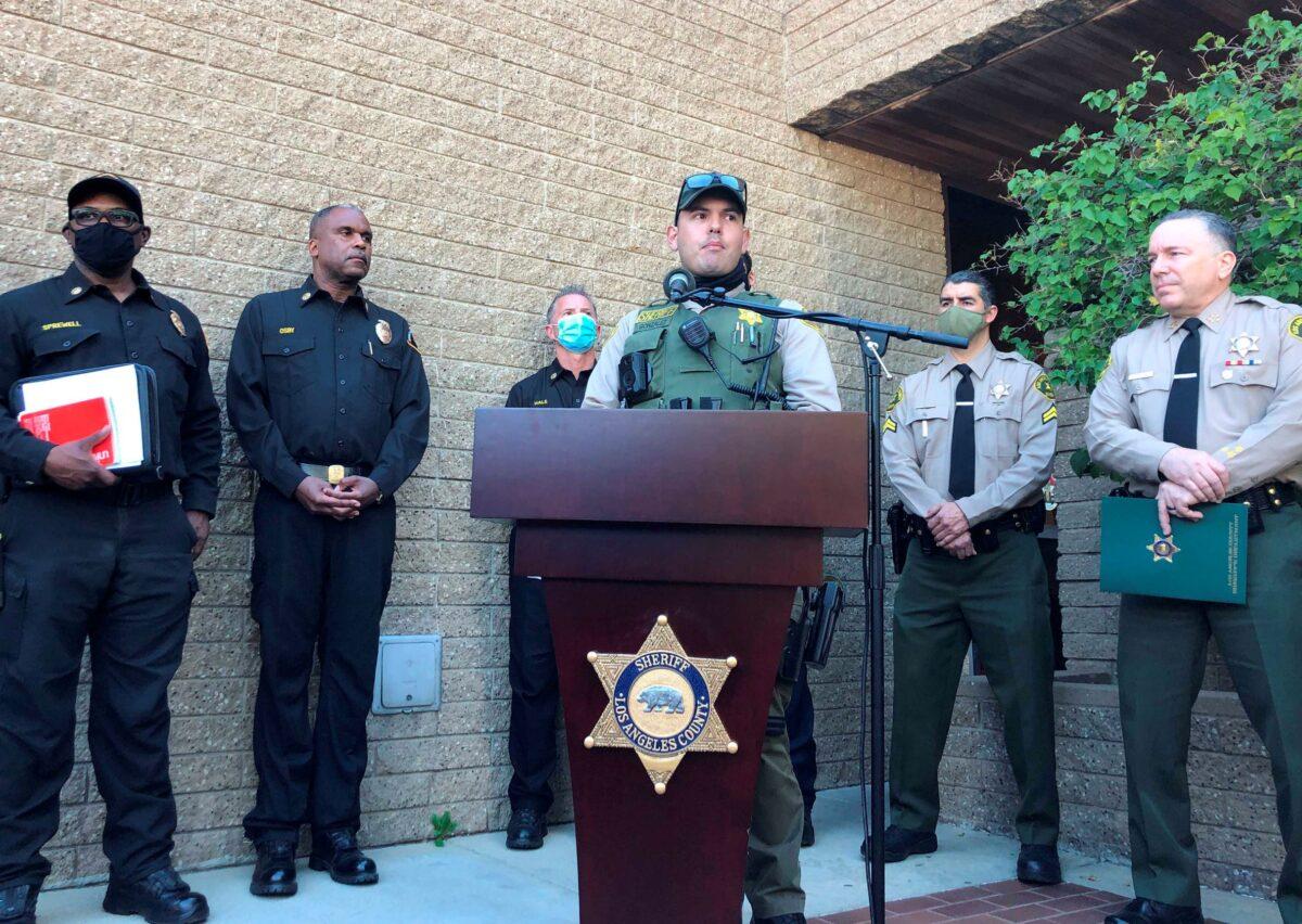 Los Angeles County Sheriff's Deputy Carlos Gonzalez speaks during a news conference at the Lomita sheriff's station in Lomita, Calif., on Feb. 23, 2021. (Stefanie Dazio/AP Photo)