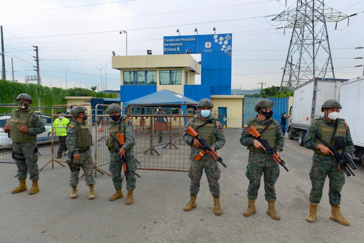  Members of the Ecuadorian Marine Force guard the Zone 8 Deprivation of Liberty Center in Guayaquil, Ecuador, on Feb. 23, 2021. (Marcos Pin Mendez/AFP via Getty Images)