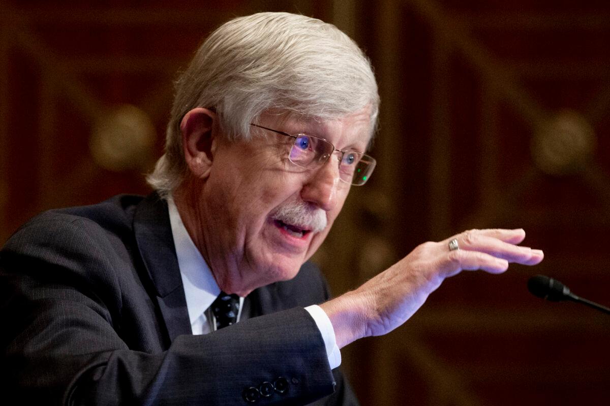  Dr. Francis Collins, director of the National Institutes of Health, appears before a Senate hearing to discuss vaccines, in Washington, on Sept. 9, 2020. (Michael Reynolds/Pool/Getty Images)