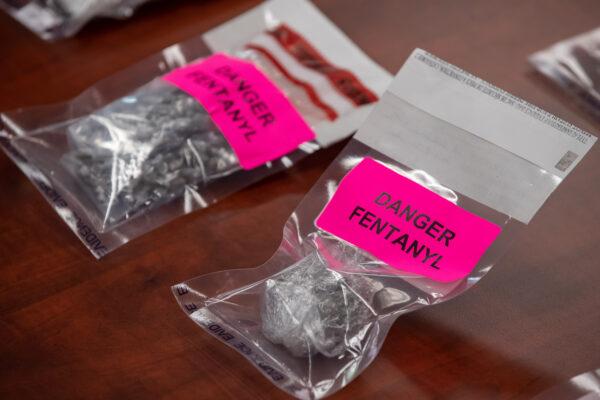 Evidence bags containing fentanyl are displayed during a news conference at Surrey RCMP Headquarters, in Surrey, B.C., on Sept. 3, 2020. (Darryl Dyck/The Canadian Press)