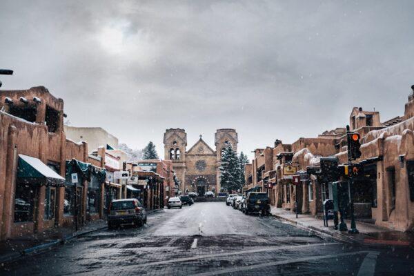 Snow falls over The Cathedral Basilica of St. Francis of Assisi in Santa Fe. (Courtesy of Tourism Santa Fe)