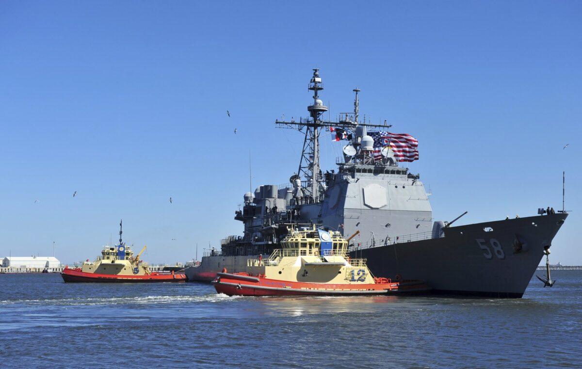 The guided-missile cruiser USS Philippine Sea leaves Naval Station Mayport in Mayport, Fla., on Feb. 15, 2014. (Mass Communication Specialist 2nd Class Marcus L. Stanley/U.S. Navy via AP)