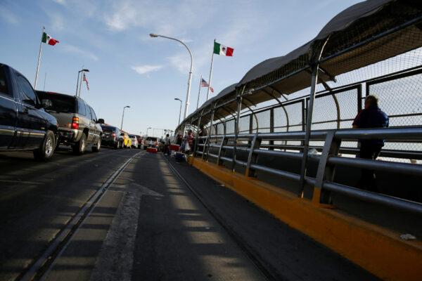 A man crosses the Paso del Norte border bridge towards El Paso, Texas, as seen from Ciudad Juarez, Mexico, on July 1, 2020. (Jose Luis Gonzalez/Reuters)