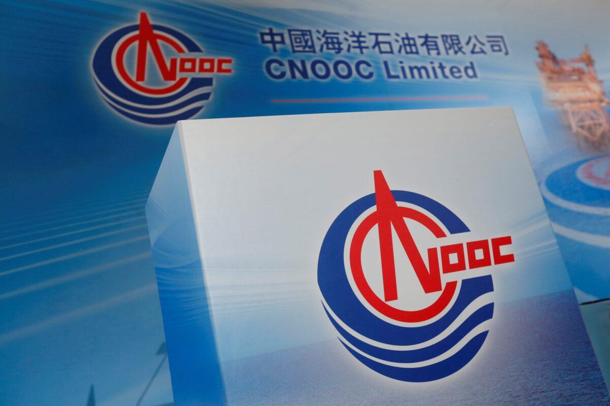 Logos of China National Offshore Oil Corp. (CNOOC) are displayed at a news conference on the company's interim results in Hong Kong, on March 23, 2017. (Bobby Yip/Reuters)
