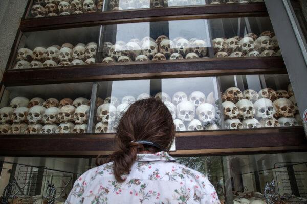 Communism has always led to mass killings. A visitor at the Memorial Stupa to Choeung Ek Killing Fields, with thousands of skulls of those killed during the Pol Pot regime, in Phnom Penh, Cambodia. (Omar Havana/Getty Images)