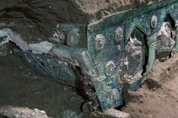 An ancient-Roman ceremonial carriage is discovered in a dig near the ancient Roman city of Pompeii, destroyed in 79 AD in a volcanic eruption, in Italy on Feb. 2021. (Luigi Spina, Pompeii Archeological Park/Ministry of Cultural Heritage and Activities and Tourism, Handout via Reuters)
