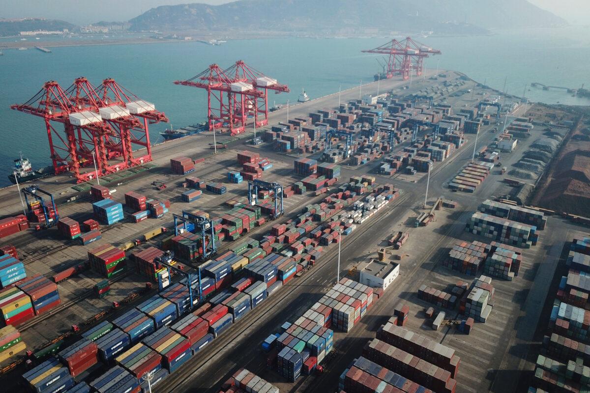 This aerial photo shows shipping containers stacked at a port in Lianyungang, in China's Jiangsu Province, on Jan. 14, 2021. (STR/AFP via Getty Images)