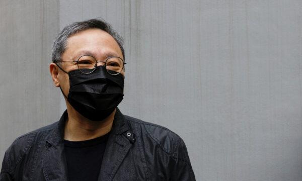 Pro-democracy activist Benny Tai arrives to report to the police station over the national security law charges in Hong Kong on Feb. 28, 2021. (Tyrone Siu/Reuters)