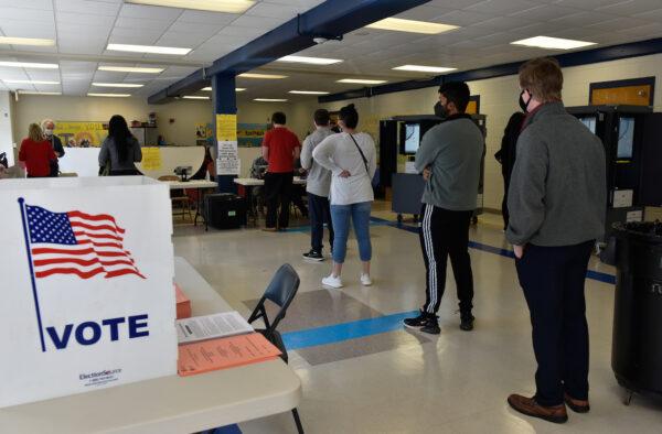 Voters go to the polls at Sara Smith Elementary polling station, in the Buckhead district, in Atlanta during the Georgia Senate runoff elections, on Jan. 5, 2021. (Virginie Kippelen/AFP via Getty Images)