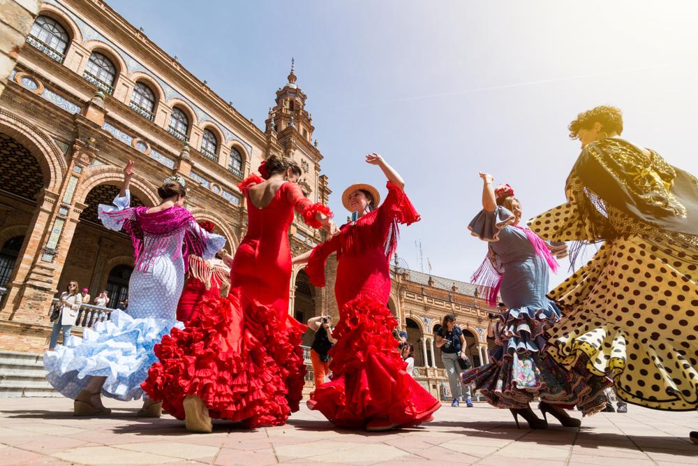 Flamenco dancers in Seville's Plaza de España. Flamenco is the traditional dance of the autonomous community of Andalusia in southern Spain. Seville is Andalusia's capital. (leonov.o/Shutterstock.com)