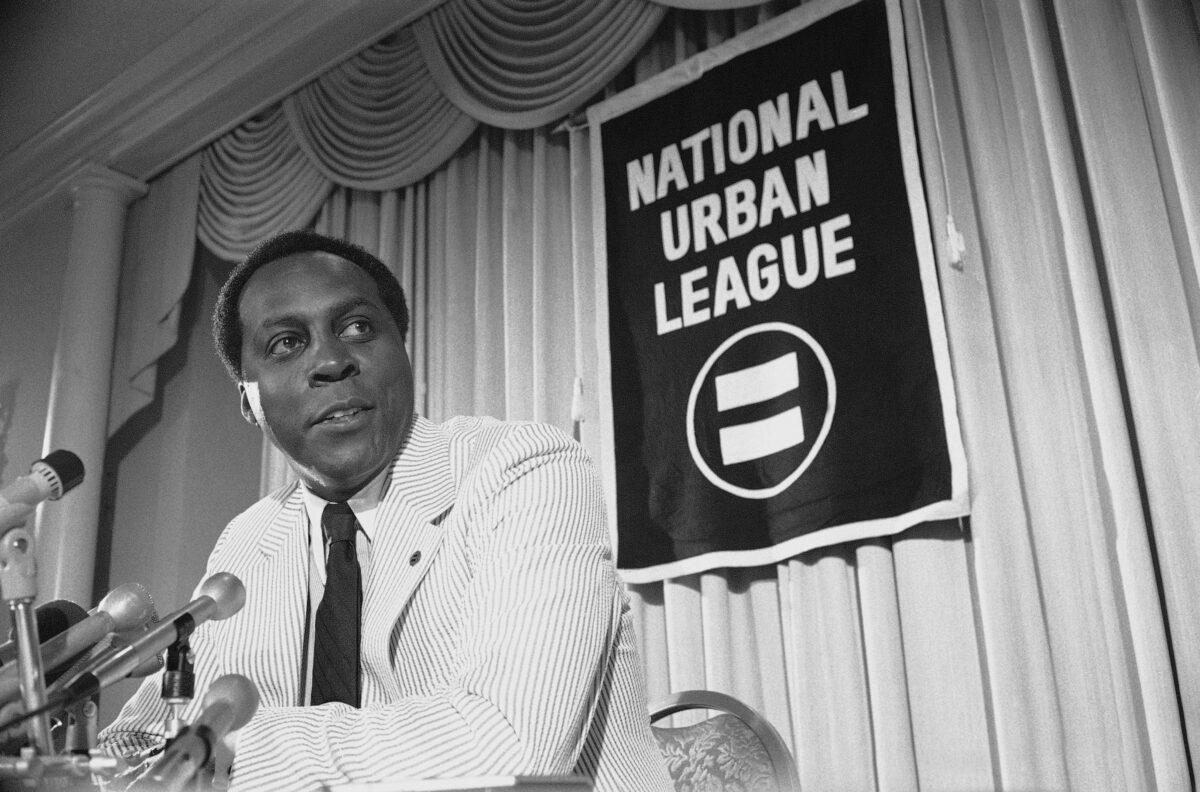 Vernon Jordan talks to reporters during a press conference in Washington, on July 27, 1977. (AP Photo)