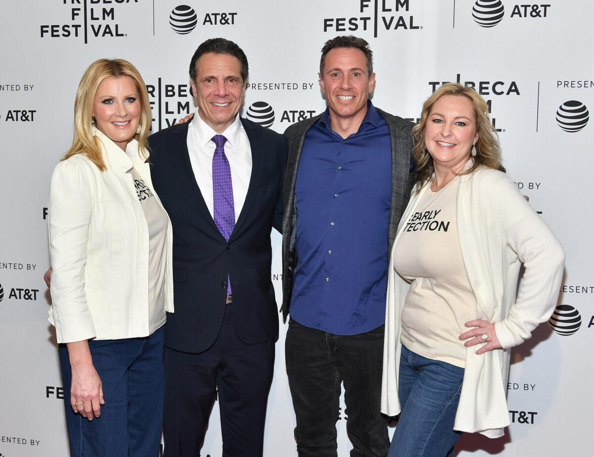 New York Gov. Andrew Cuomo and his brother Chris Cuomo, center, attend a screening in New York City with companions on April 26, 2018. (Dia Dipasupil/Getty Images for Tribeca Film Festival)