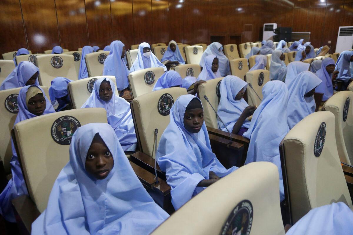 Students who were abducted by gunmen from the Government Girls Secondary School in Jangebe last week, are seen after their release in Gusau, northern Nigeria, on March 2, 2021. (Sunday Alamba/AP Photo)