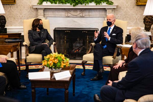 President Joe Biden holds a meeting on cancer with Vice President Kamala Harris and other lawmakers in the Oval Office at the White House on March 3, 2021. (Samuel Corum/Getty Images)