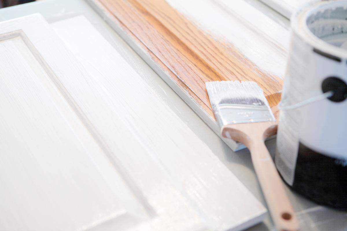 Remove and clean all cabinet doors before you start painting. (iStockphoto)