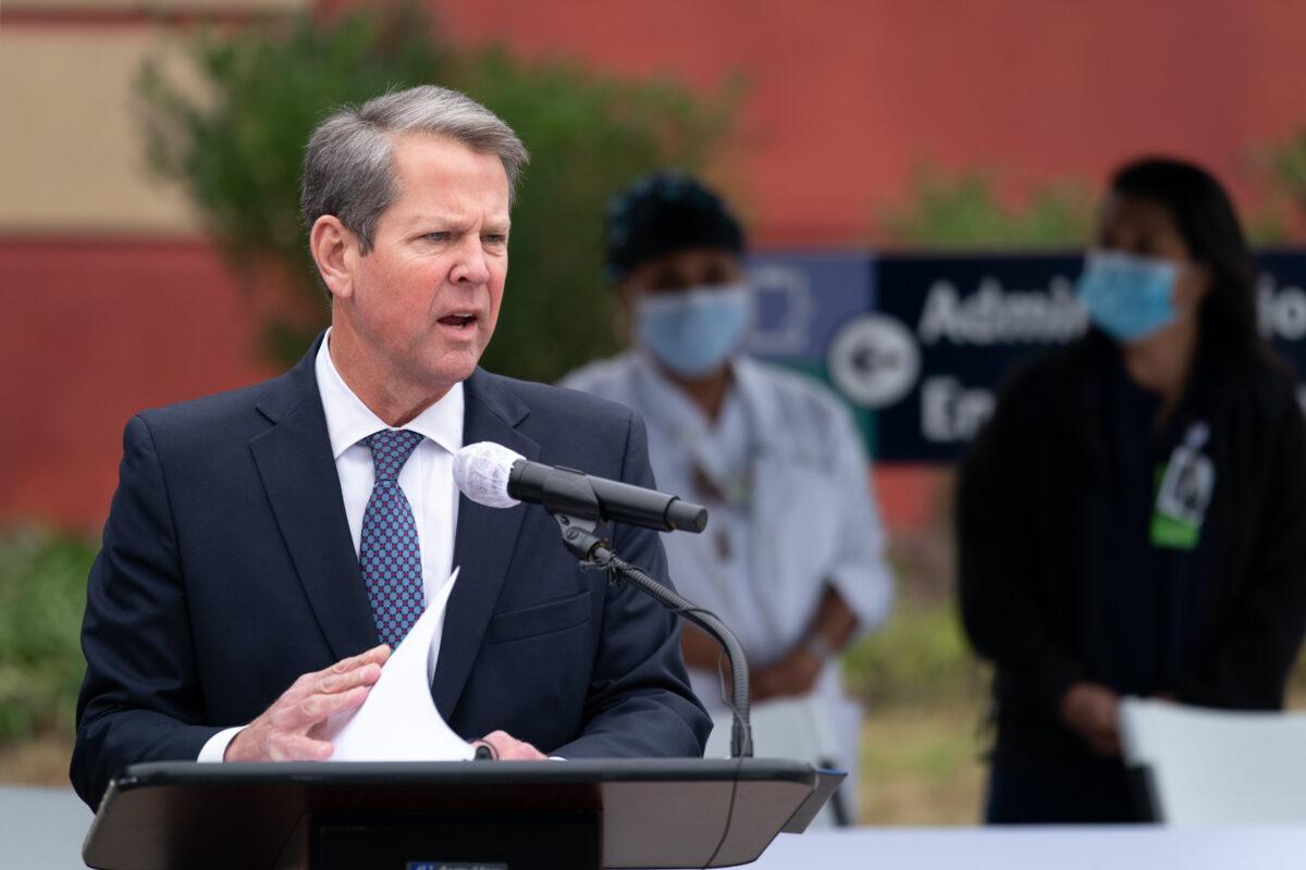 Georgia Gov. Brian Kemp speaks to the media outside of the Chatham County Health Department in Savannah, Georgia, on Dec. 15, 2020. (Sean Rayford/Getty Images)