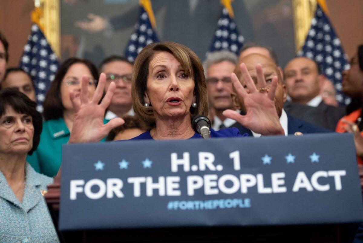 Speaker of the House Nancy Pelosi (D-Calif.) speaks alongside Democratic members of the House about H.R.1, the "For the People Act," at the US Capitol in Washington, on Jan. 4, 2019. (Saul Loeb/AFP via Getty Images)