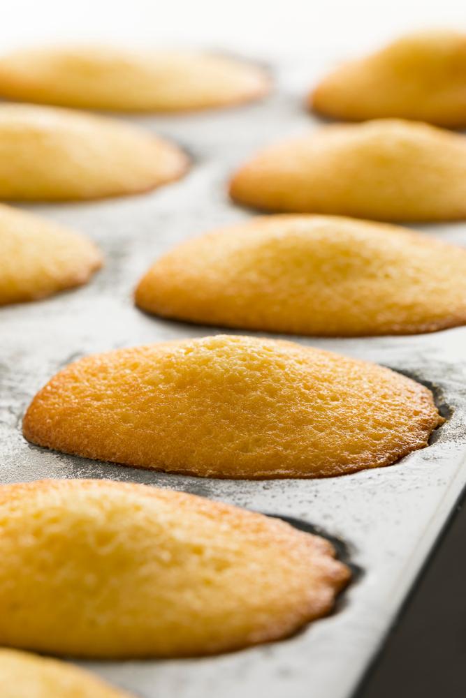 To help the madeleines form the classic “bump” on their backs, freeze your pans before filling them with batter. (Picture Partners/Shutterstock)