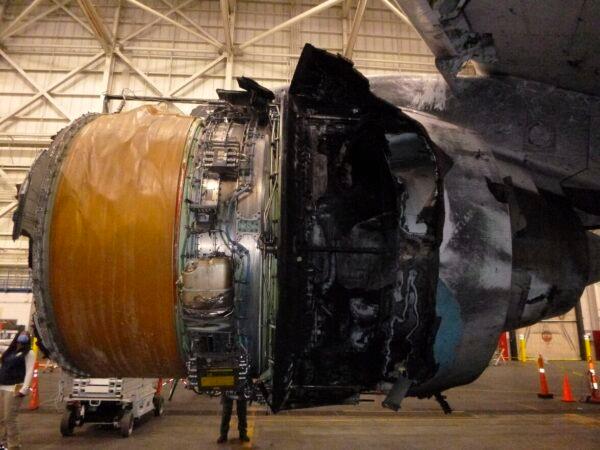 This photo provided by The National Transportation Safety Board shows the damaged engine of United Airlines Flight 328, on March 5, 2021. (The National Transportation Safety Board via AP)