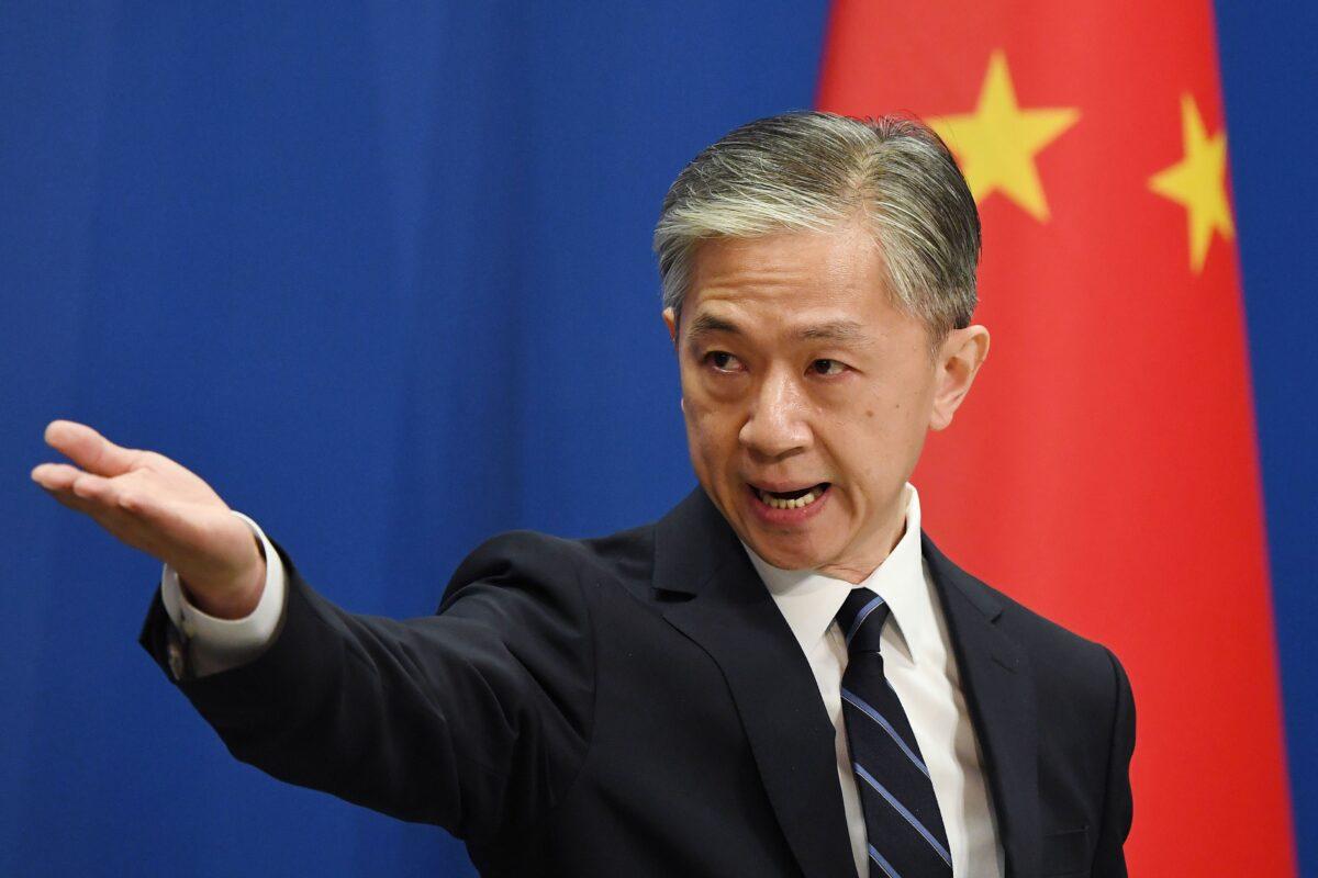 Chinese Foreign Ministry spokesman Wang Wenbin takes a question during a daily Foreign Ministry briefing in Beijing on July 24, 2020. (Greg Baker/AFP via Getty Images)