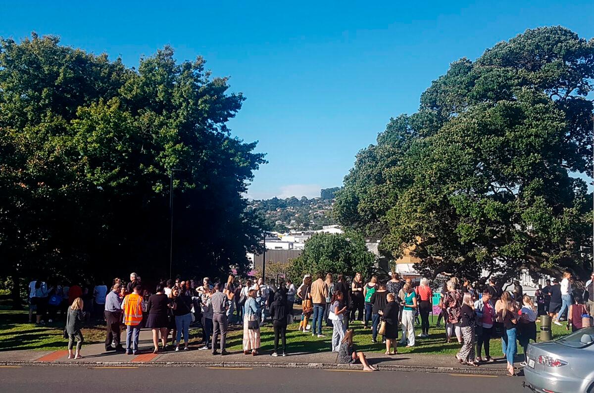 People gather on high ground as a tsunami warning is issued in Whangarei, New Zealand, on Friday, March 5, 2021. (Mike Dinsdale/New Zealand Herald via AP)