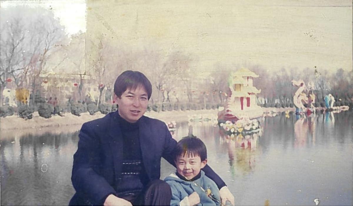 Eric Jia as a toddler with his father Ye Jia. (Courtesy of Eric Jia)