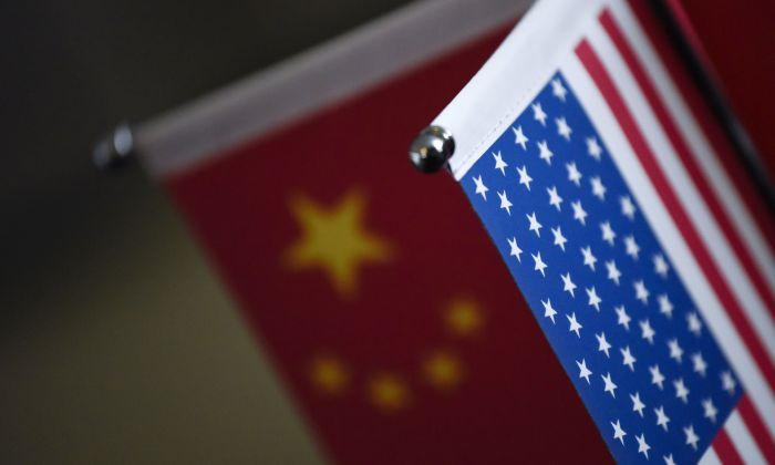 Chinese and American flags are displayed in a company in Beijing, China, on Aug. 16, 2017. (Wang Zhao/AFP/Getty Images)