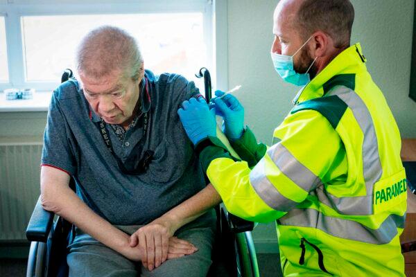 A man receives a COVID-19 vaccine in Aalborg, Denmark, on March 5, 2021. (Bo Amstrup/Ritzau Scanpix/AFP via Getty Images)