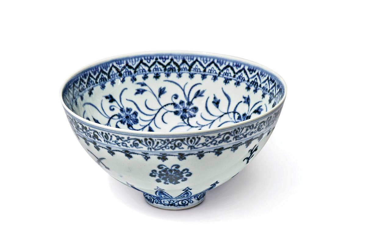 This photo, provided by Sotheby's, in New York, on Tuesday, March 2, 2021, shows a small porcelain bowl bought for $35 at a Connecticut yard sale that turned out to be a rare 15th century Chinese artifact worth between $300,000 and $500,000. (Sotheby's via AP)