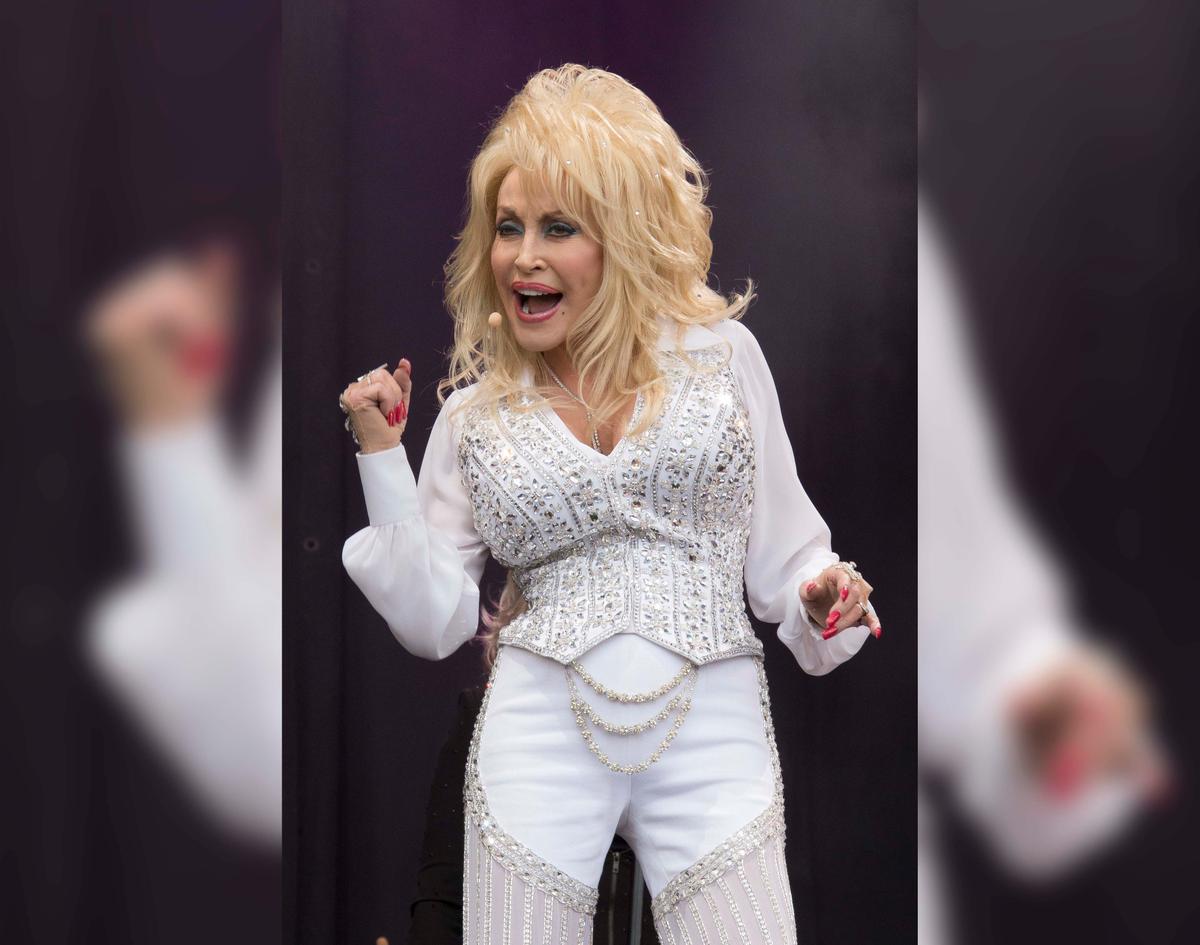 Dolly Parton performs on the main Pyramid stage at Glastonbury music festival, England on June 29, 2014. (Joel Ryan/Invision/AP)