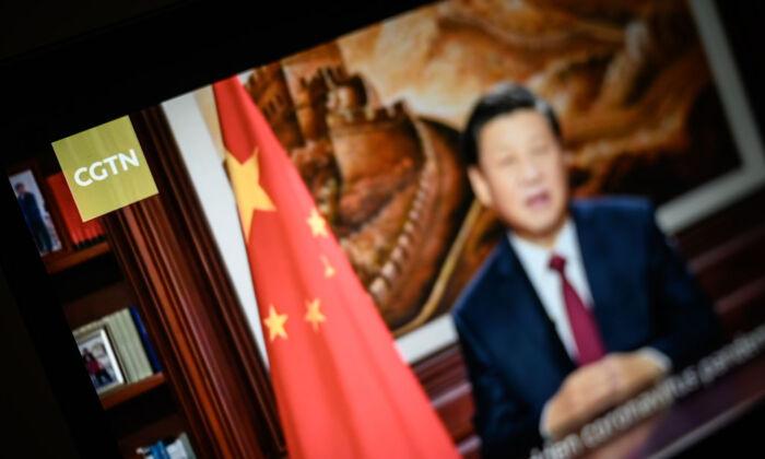 Chinese leader Xi Jinping is seen on a program from the CGTN archive as it plays on a computer monitor in London, England, on Feb. 4, 2021. (Leon Neal/Getty Images)
