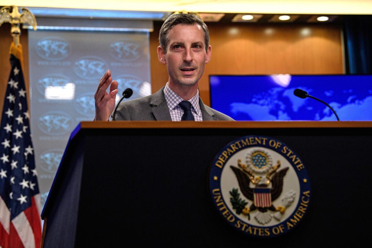 State Department spokesman Ned Price gestures as he speaks during the daily press briefing at the State Department in Washington, on Feb. 25, 2021. (Nicholas Kamm/Pool via Reuters)